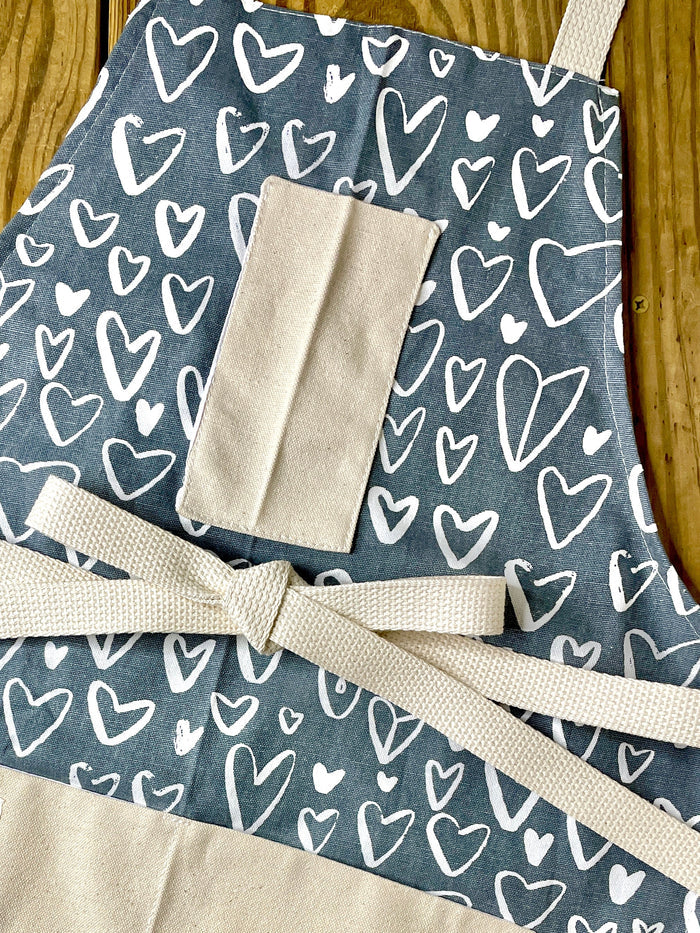 Amanda Bright Designs chalkboard heart apron on gray fabric neutral valentines day