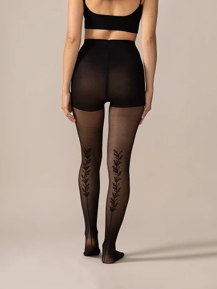 Back full view of the legs in the Back Vine Sheer Tights in Black, showing the vine detail from behind.