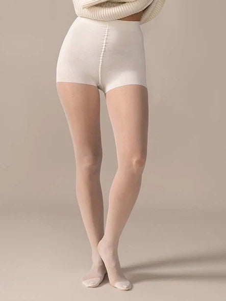 Front view close-up of the legs in the Back Vine Sheer Tights in Creamy White with natural smoothing panty.