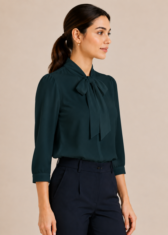 Flurr teal blue bow tie neck top, right side view