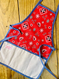 Amanda Bright Designs Red bandana-patterned children’s apron with denim blue trim and strings