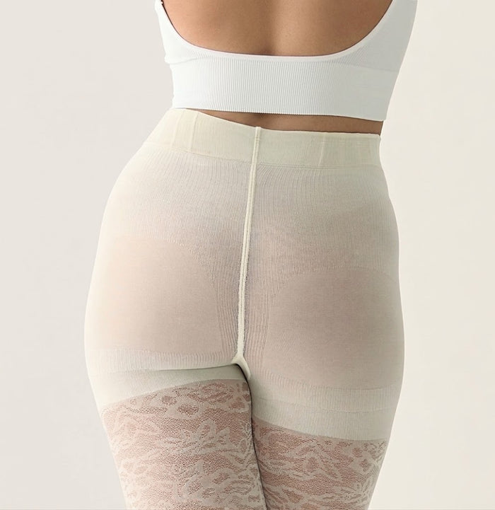 Back view highlighting the high-waisted Contour Shaping Panty with push up effect on the Floral Lace tights in Creamy White.
