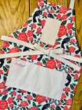 Amanda Bright Designs Floral apron with red roses and revolver guns