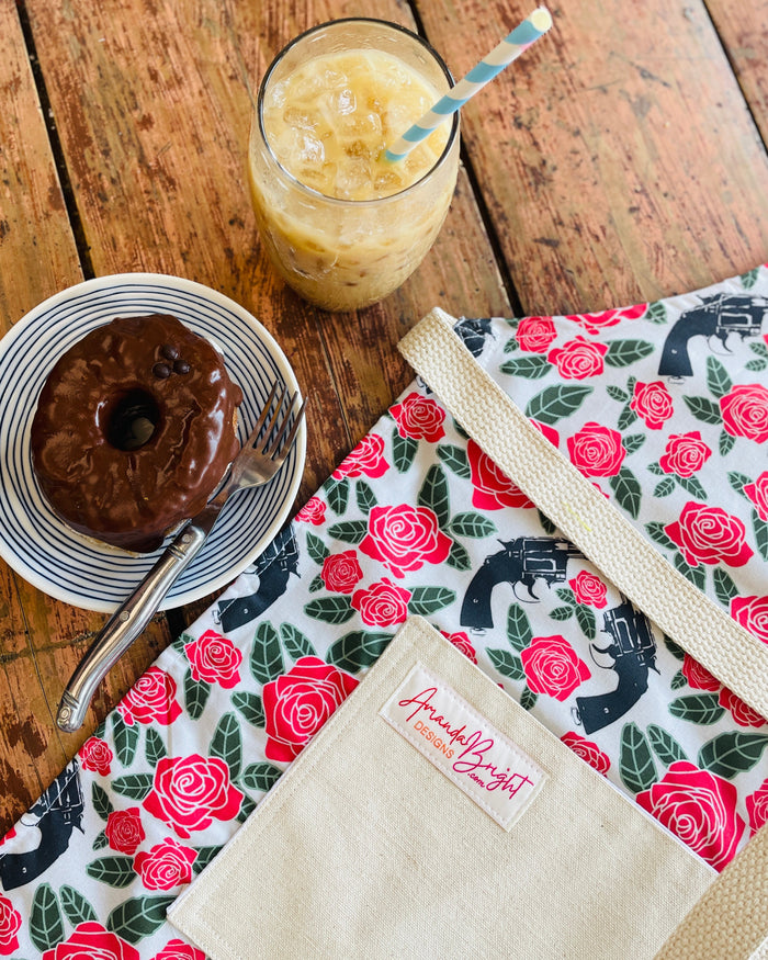 Amanda Bright Designs Floral apron with red roses and revolver guns