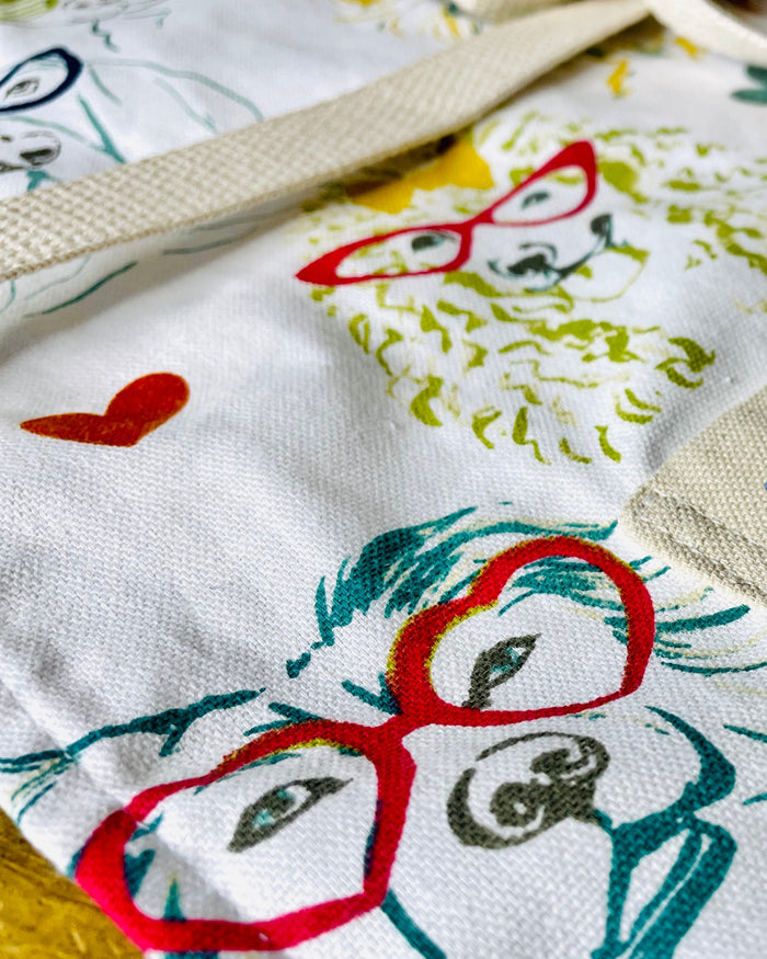 Iris Apron Dogs wearing glasses fashion fun colorful apron closeup view