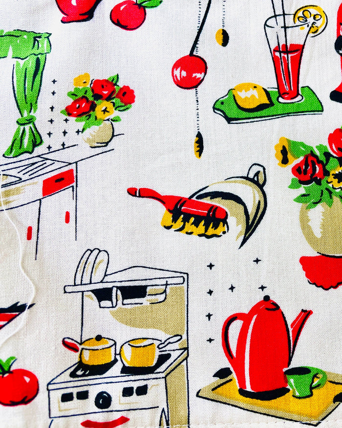 Amanda Bright Designs Lucille apron 1950s kitchen appliances pattern in red and green with red pockets and strings