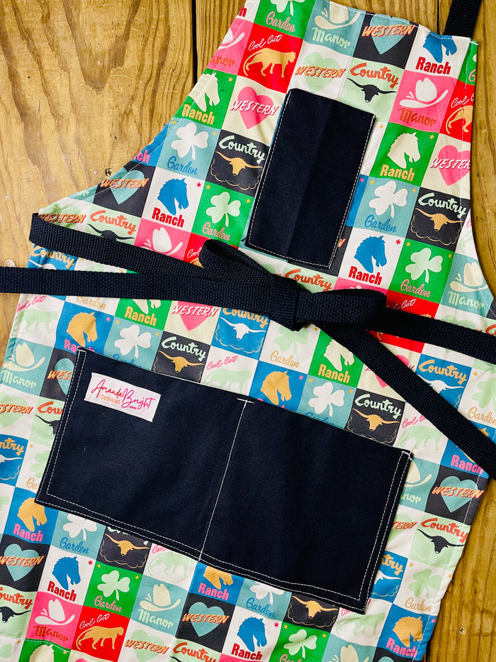 Amanda Bright Designs multicolor patchwork ranch western garden country life apron with black cotton strings and black canvas pockets