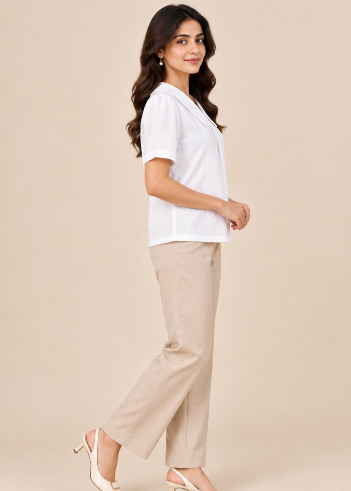Flurr Maison Collar Top in white showing right side fit and short sleeves