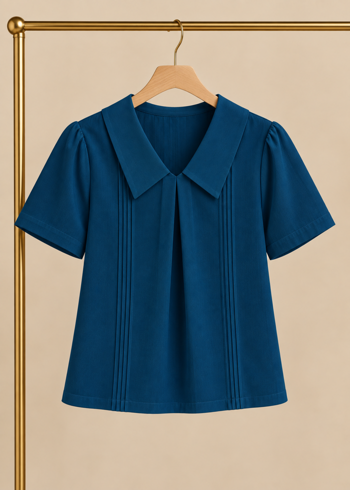 Flurr teal blue Maison Collar Top displayed on hanger