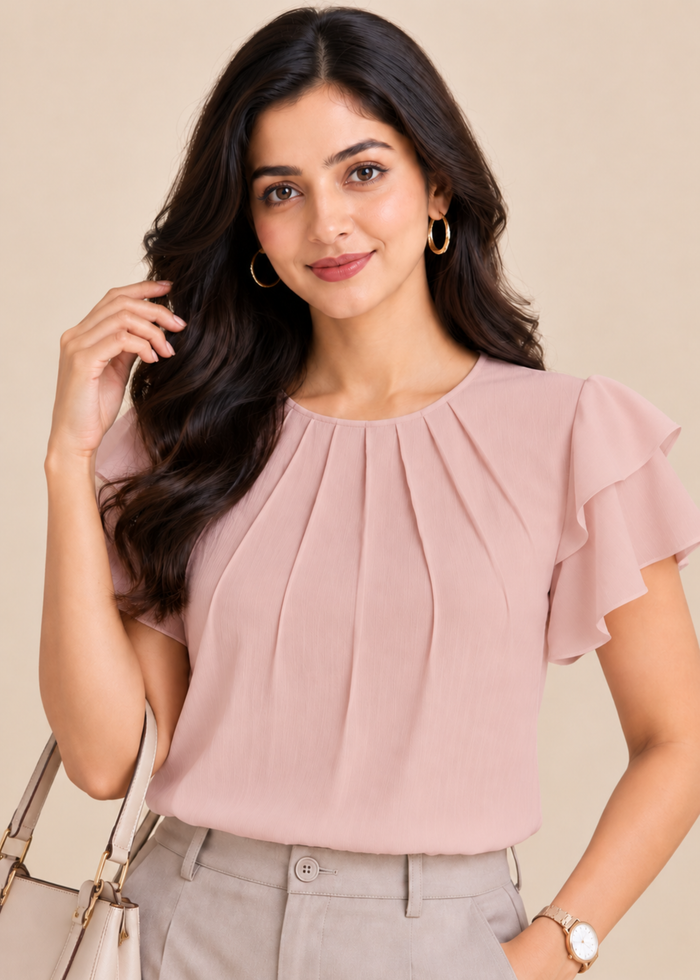 Flurr soft pink Pearl Pleat Top with flutter sleeves front close-up