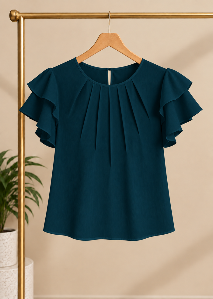 Flurr teal blue Pearl Pleat Top with flutter sleeves displayed on hanger