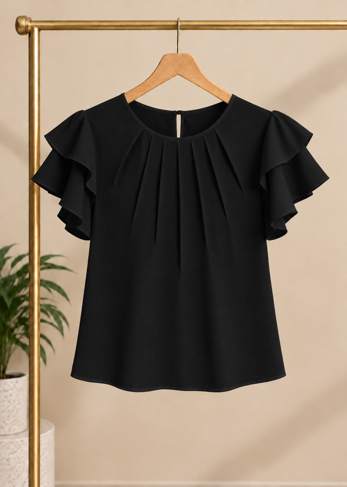 Flurr black Pearl Pleat Top with flutter sleeves displayed on hange