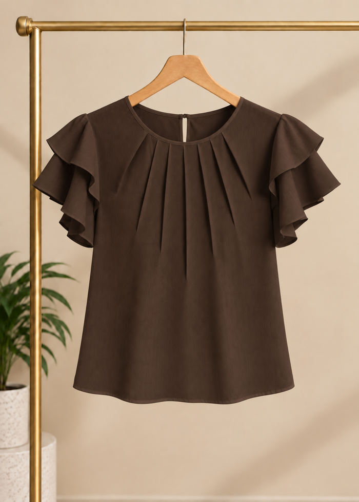 Flurr chocolate brown Pearl Pleat Top with flutter sleeves displayed on hanger