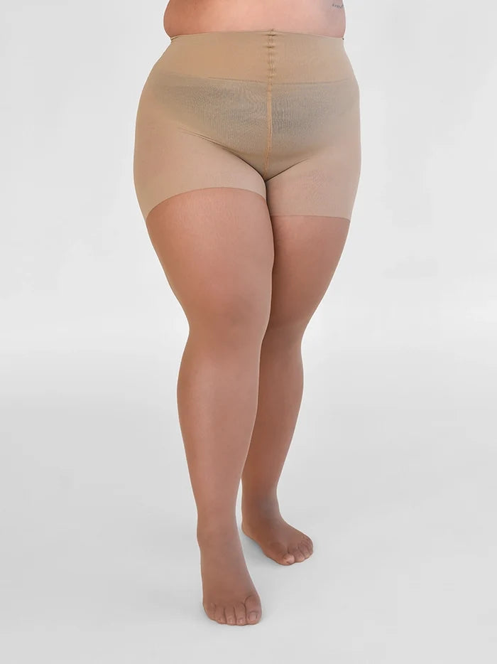 Close-up of the legs in the Sheer Shaping Tights 30D in Dune, showing the sheer, barely-there finish in plus size panty.