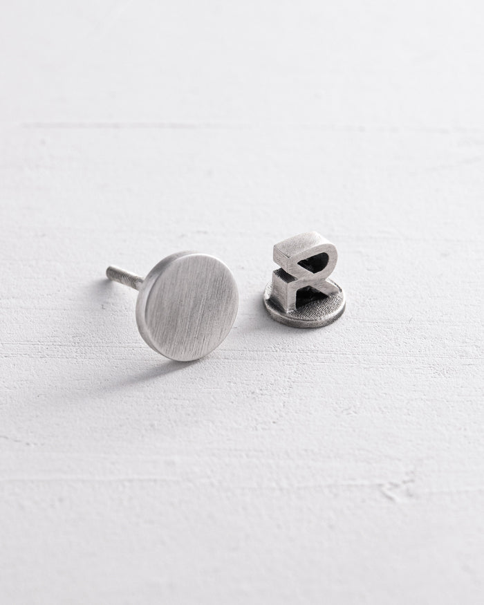 Silver single earring PUNKT
