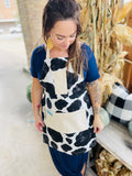 Susanna Apron cowhide black and white holstein Susanna Dickinson Lady of the Alamo model wearing cowprint apron
