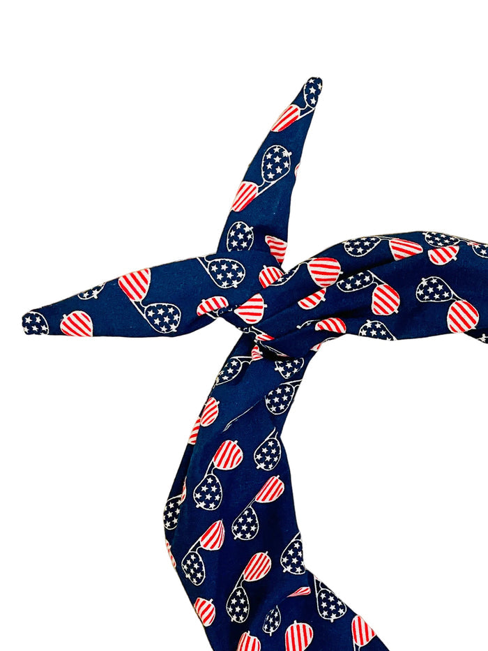 Amanda Bright Designs aviator sunglasses style, navy blue headband with red white and blue patriotic pattern