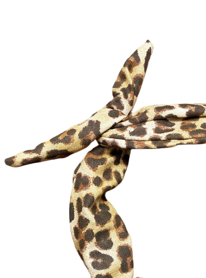 Amanda Bright Designs moldable bendable Leopard print headband on a white background