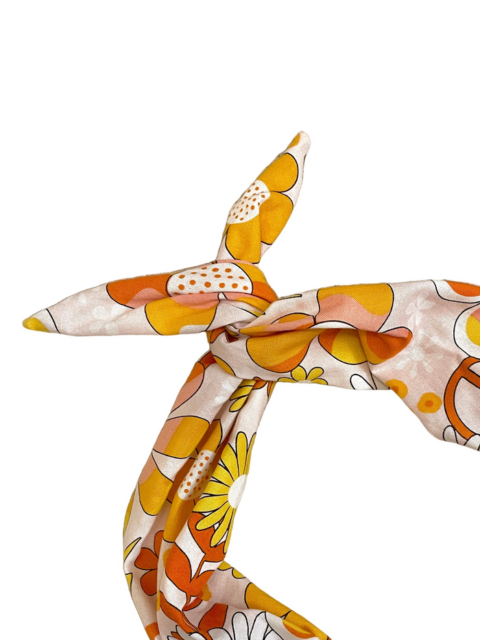 Amanda Bright Designs Original Tie Headband Peace Out Peace Symbols Flower Power Fabric for women  vintage-inspired print mixes peace signs, retro daisies, and funky florals in shades of burnt orange, golden yellow, cream, and warm brown