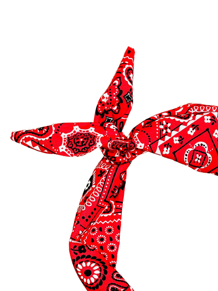 Amanda Bright Designs red bandana tie headband with a black and white paisley pattern, tied in a knot