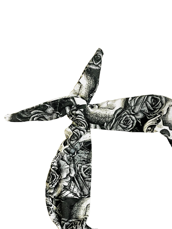 Amanda Bright Designs tie headband featuring skulls and roses tattoo style design in monotone black and cream