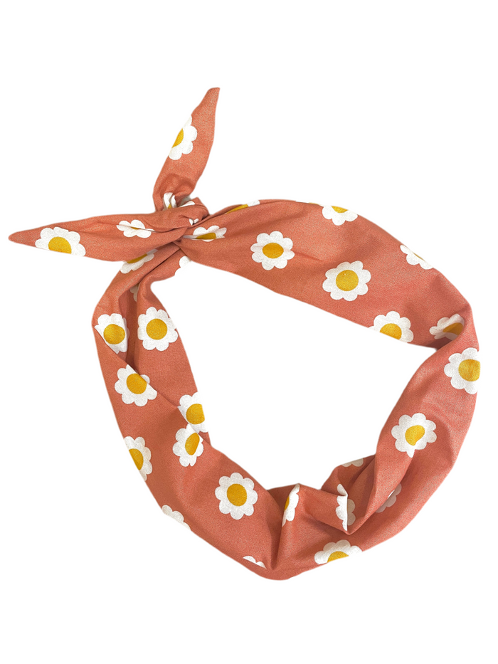 Amanda Bright Designs floral pattern headband in coral peach with white flowers and yellow centers